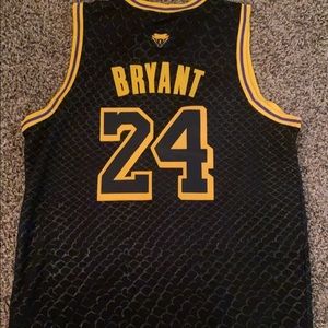 Kobe Bryant Jersey, Brand new. Never worn. Fits like a large
